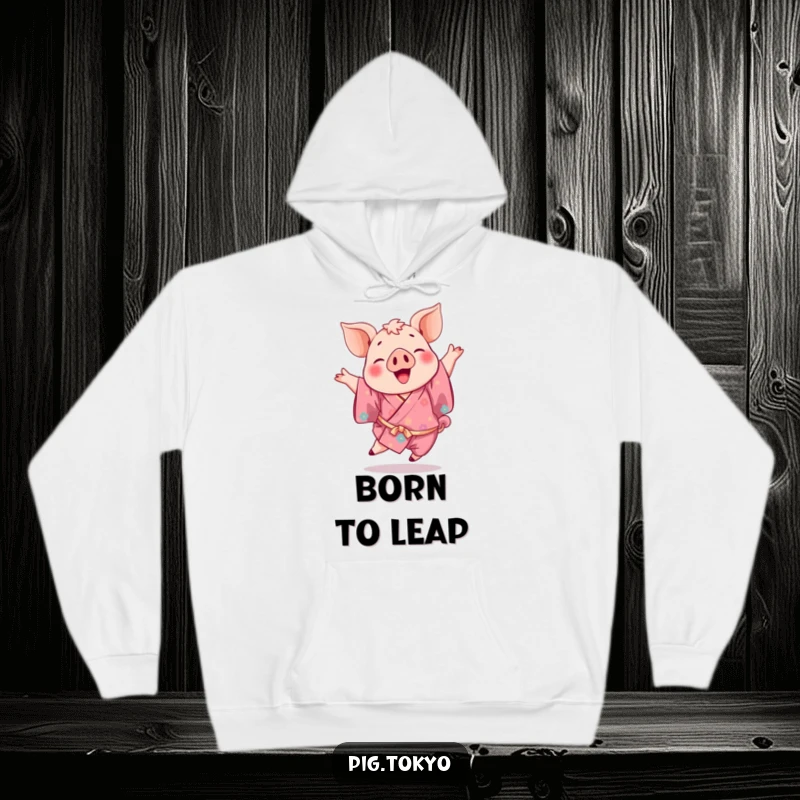 Funny hoodie design of a playful pig in a vibrant kimono executing a joyful leap, perfect for staying warm and cheerful.