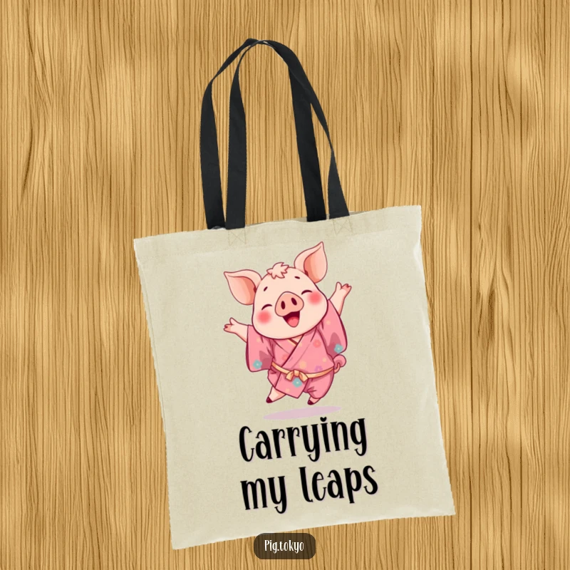 Funny tote bag showcasing a playful pig in a vibrant kimono mid-leap, ideal for shopping and carrying happiness.